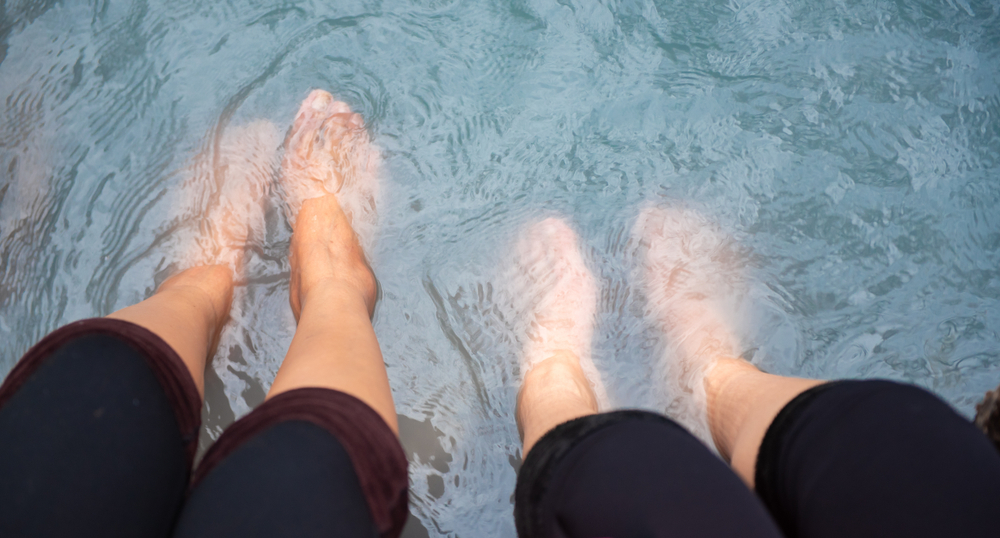 People,Soaking,Legs,In,Iron,Mountain,Hot,Springs.