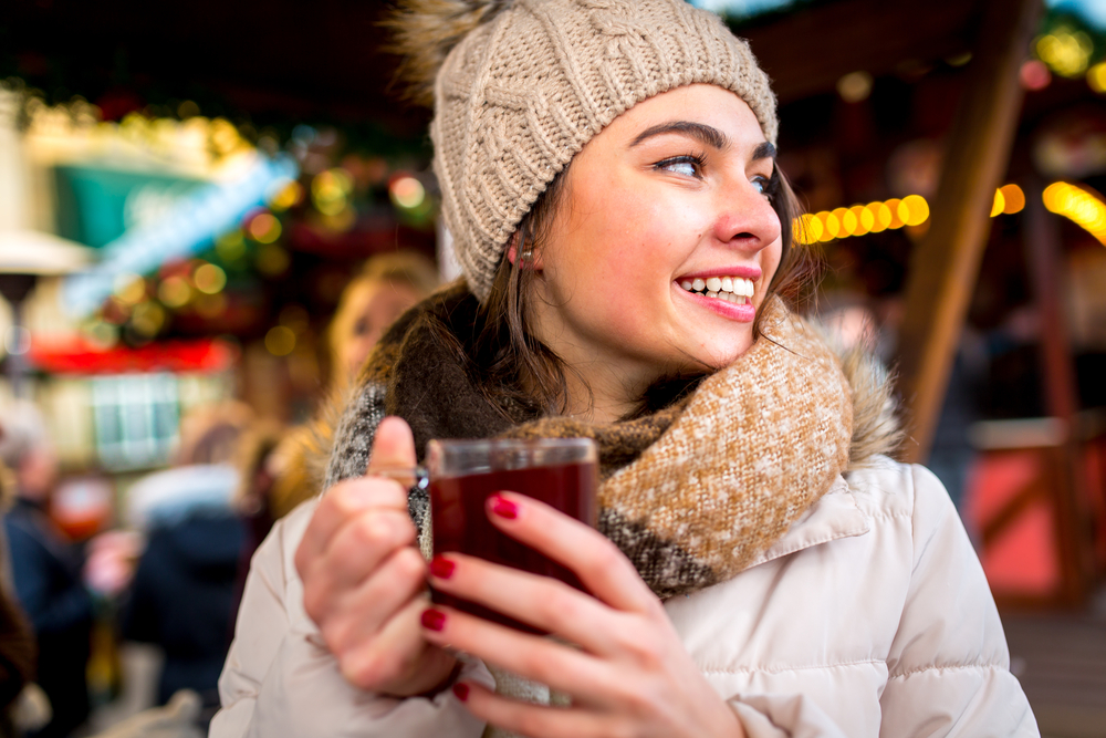 Portrait,Of,A,Young,Woman,On,The,Christmas,Market,In